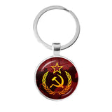 SLEUTELHANGER USSR WITTE STER HAMER EN SIKKEL VINTAGE BRONS