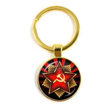 SLEUTELHANGER USSR WITTE STER HAMER EN SIKKEL VINTAGE