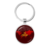 SLEUTELHANGER USSR WITTE STER HAMER EN SIKKEL VINTAGE BRONS