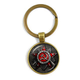 SLEUTELHANGER USSR WITTE STER HAMER EN SIKKEL VINTAGE